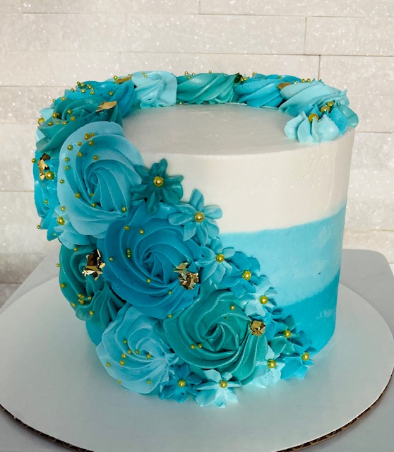 Blue ombre rosette cake.... - Susan's Specialty Cakes | Facebook